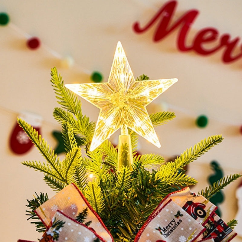 The Top Star Of The Christmas Tree Is Decorated With A Five-Pointed Star Lamp