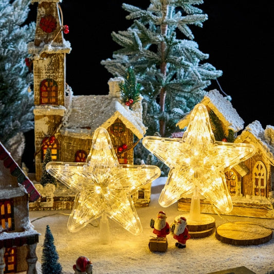 The Top Star Of The Christmas Tree Is Decorated With A Five-Pointed Star Lamp