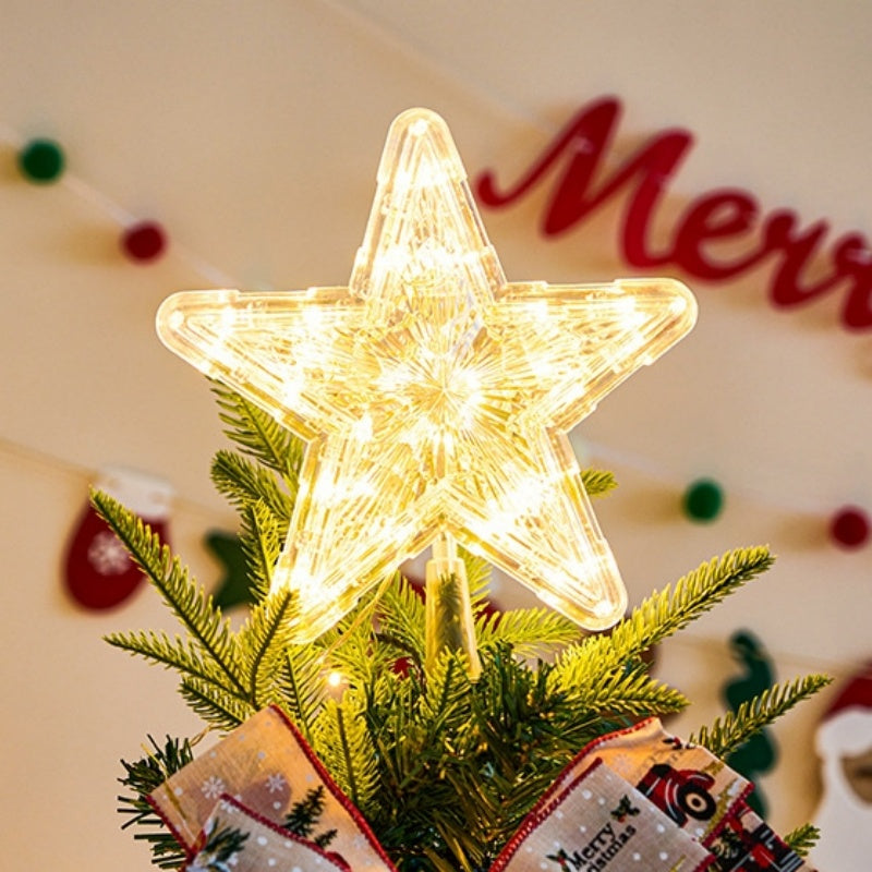 The Top Star Of The Christmas Tree Is Decorated With A Five-Pointed Star Lamp