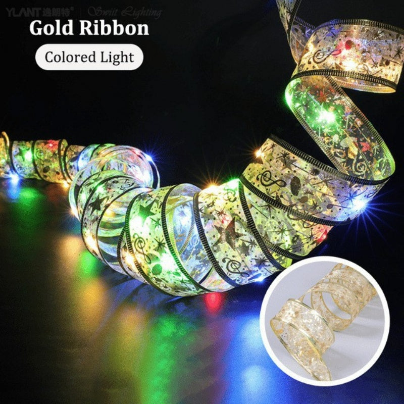 The Christmas Tree Is Decorated With Ribbons And Colorful Lights