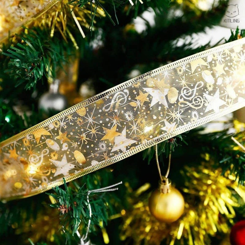 The Christmas Tree Is Decorated With Ribbons And Colorful Lights